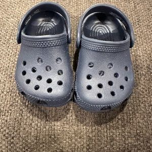 Baby crocs brand new never worn no tags size 3 navy blue. Super cute!